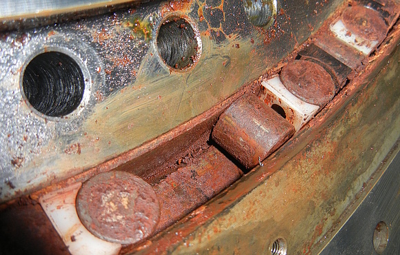 Close up of a  bearing damage and damaged rolling elements